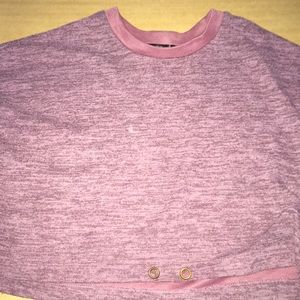 A pink long sleeve crop top